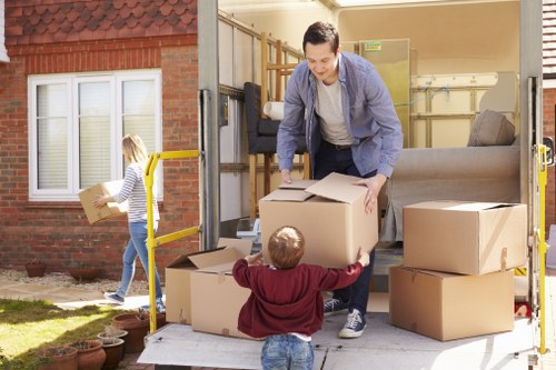 Removal team protecting furniture during a move