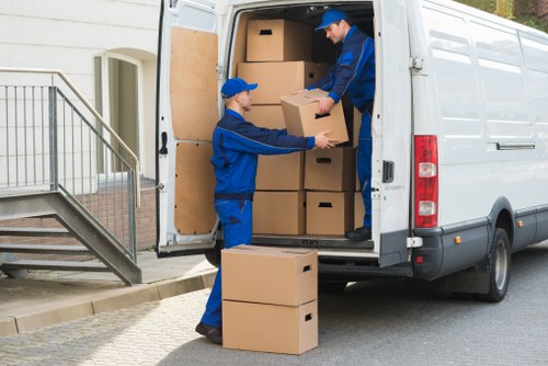 Careful wrapping of fragile household items during a local move