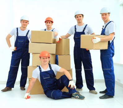 Removal team planning a move in Covent Garden with boxes and furniture
