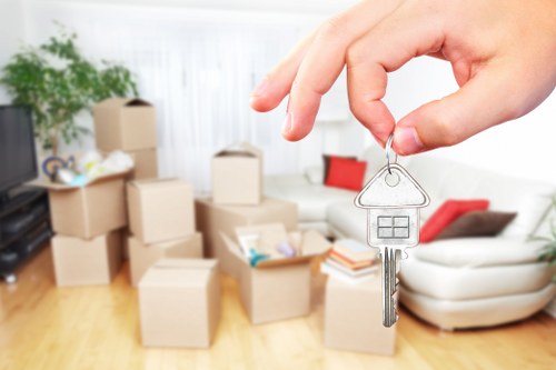 Packed boxes and furniture prepared for a residential move in Covent Garden