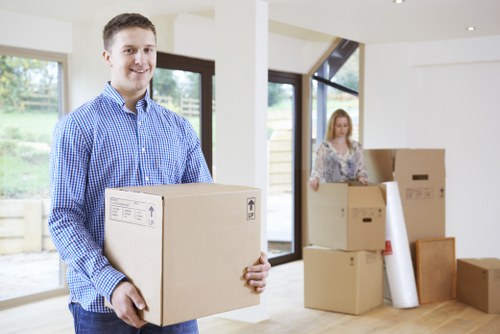 Local movers loading boxes and furniture for a Coventgarden flat or office move